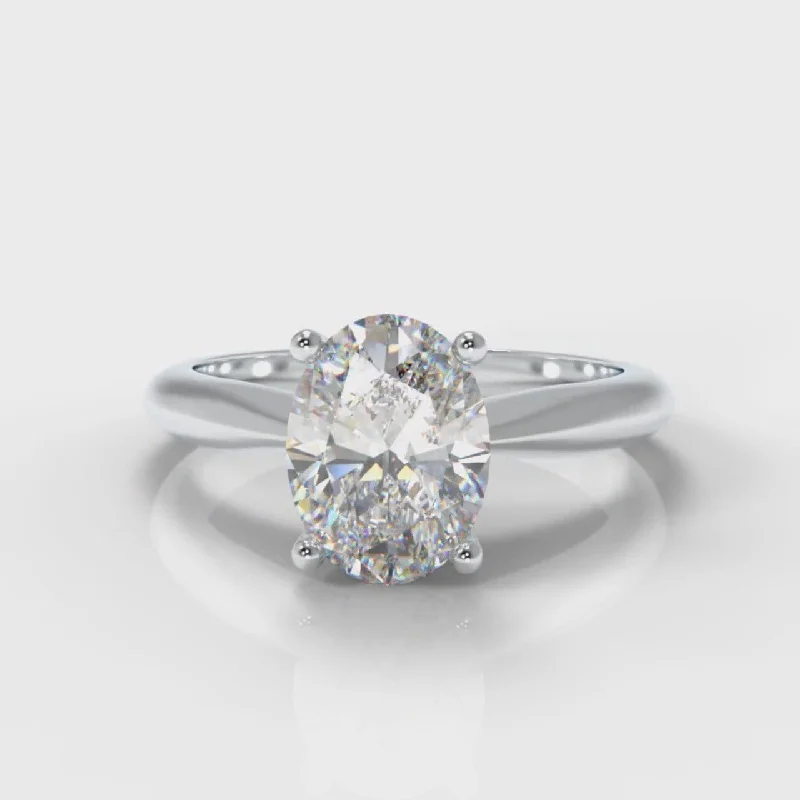 Round Brilliant Engagement RingsCarrée Solitaire Oval Diamond Engagement Ring