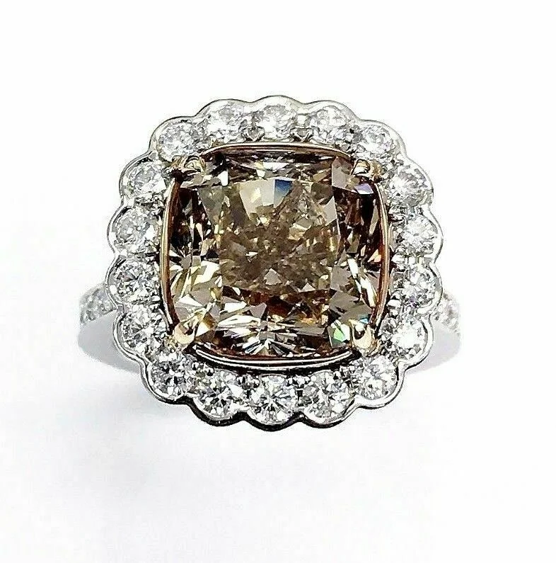 Emerald Engagement RingsCustom Made 6.99 Carats t.w. Diamond Halo Ring 6.11 Carats Fancy Y/B Center GIA