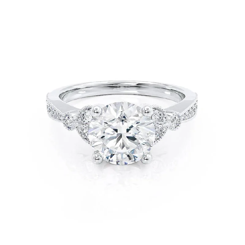 Round Brilliant Engagement RingsLILIANA - Round Moissanite & Diamond 950 Platinum Shoulder Set Ring