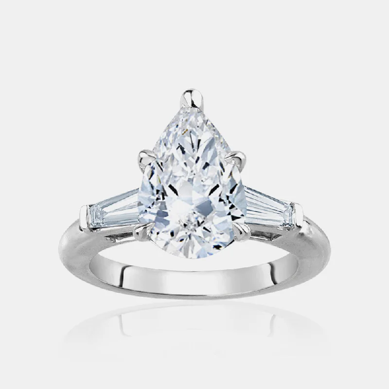 Halo Diamond Engagement RingsPear Shape Engagement Ring with Trapezoids side stones