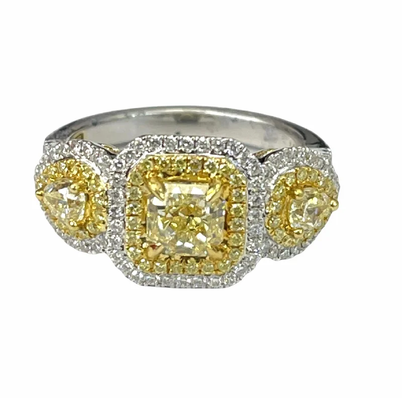 Contemporary Engagement RingsRadiant and Pear Natural Fancy Yellow Diamond Ring 18kt