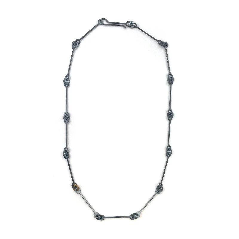 Bold geometric pendant necklaces for women who enjoy contemporary, avant-garde designs -Oxidized and Gold Chain Link Necklace