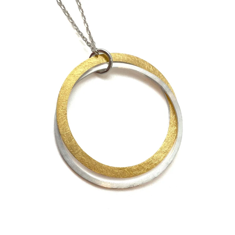 Stunning opal pendant necklaces for women who love colorful, iridescent jewelry designs -Silver and Gold Double Circle Pendant