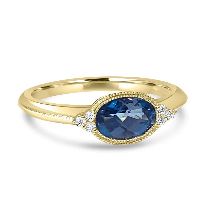 Mixed rings with dual metals for finger flair -14K Yellow Gold Bezel Set London Blue Topaz Bezel Ring