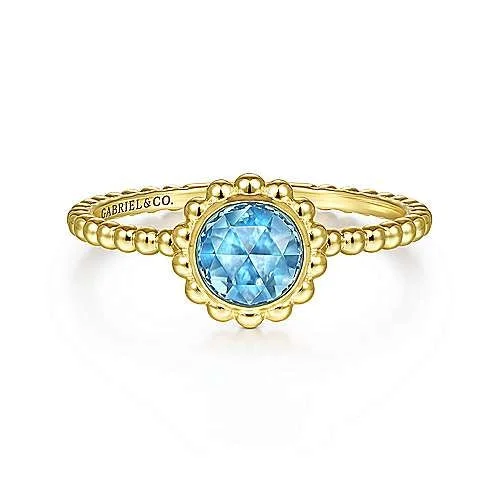 Rings perfect for romance with sweet stone details -14K Yellow Gold Round Blue Topaz Beaded Ring