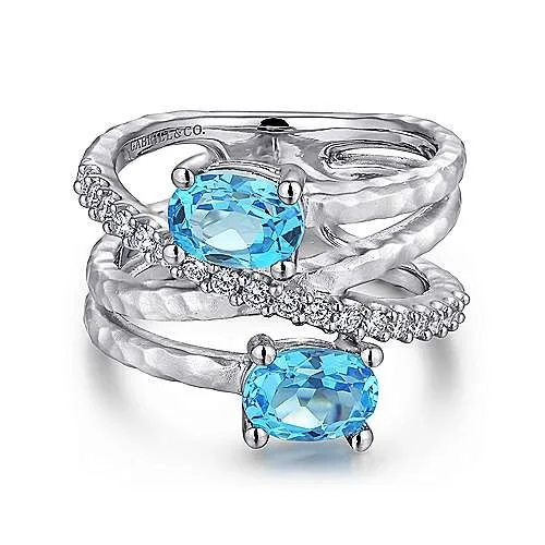 Rings great for events with special stone accents -Sterling Silver Multi Row Blue Topaz and White Sapphire Ring