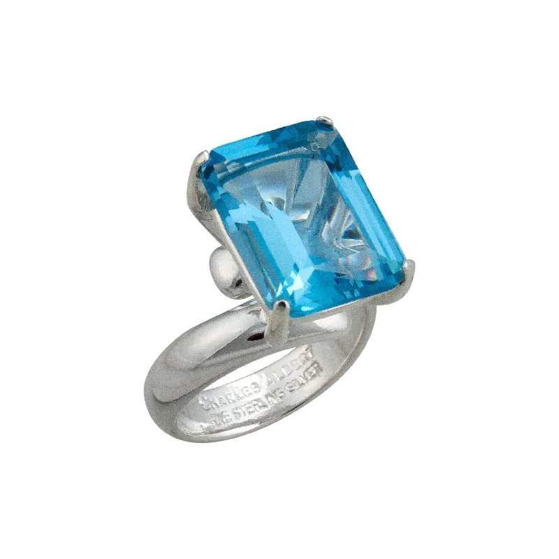 Rings featuring citrine for golden finger radiance -Sterling Silver Blue Topaz Rectangle Prong Set Adjustable Ring